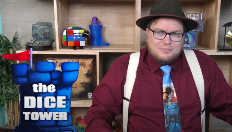 The Dice Tower founder and host Tom Vasel talking on a YouTube video